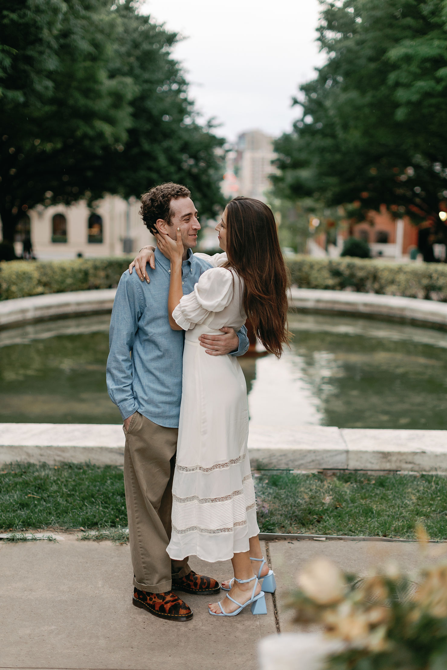 Intimate moment, whispered secrets, hidden alleyway, romantic connection, Baltimore engagement session, love story