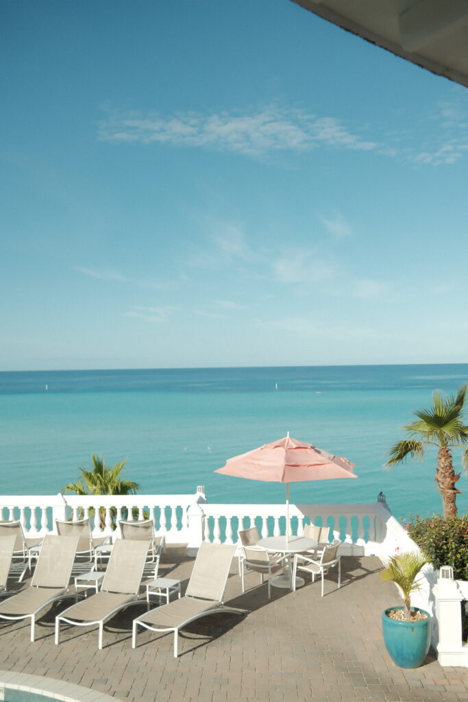 Sunlight reflecting on clear turquoise water along Bermuda’s South Shore beaches.