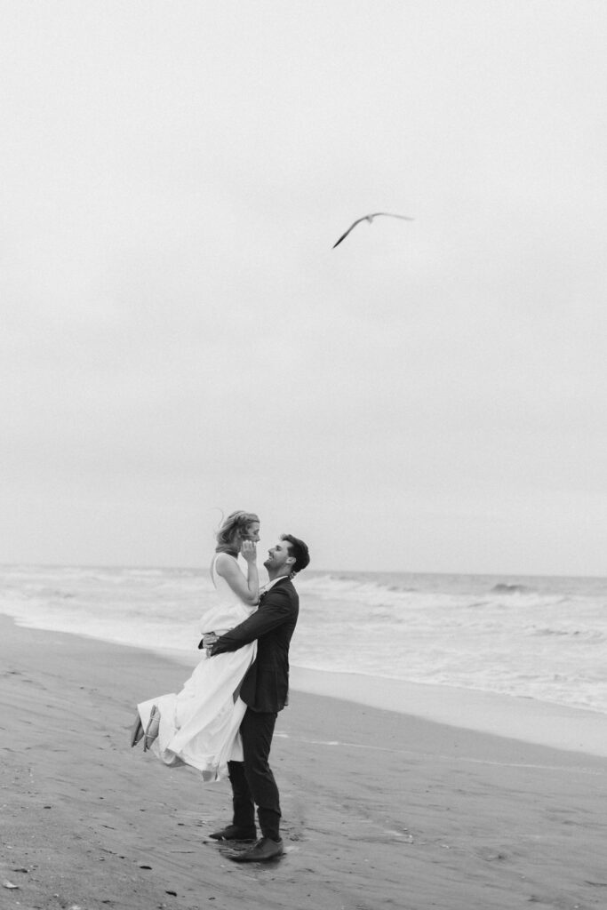 Wedding portraits on Atlantic Beach, North Carolina in the sand