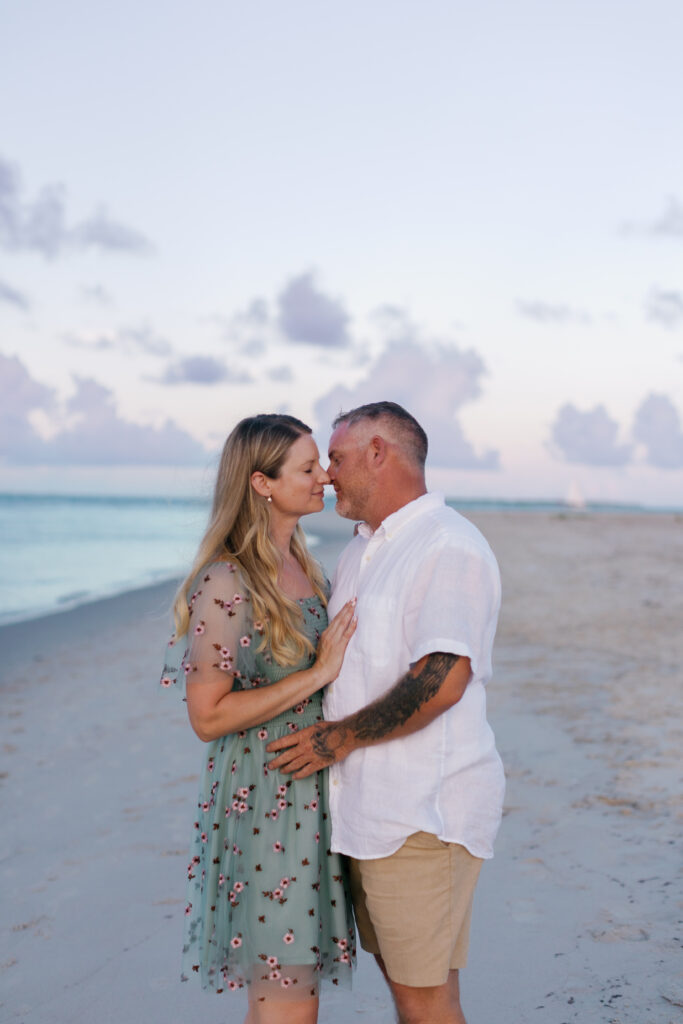 Newly engaged couple celebrating on the Crystal Coast