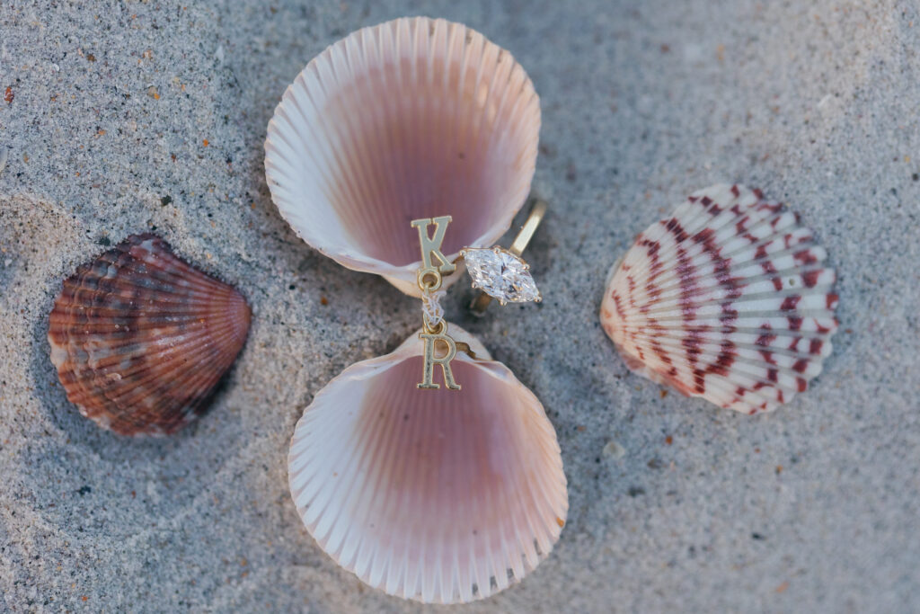 Engagement ring in seashell ring box during Atlantic Beach proposal