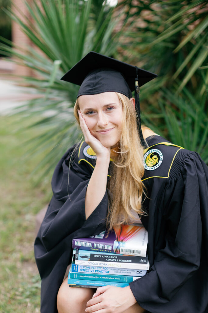 Cap and gown senior portraits on the beach at Atlantic Beach NC
